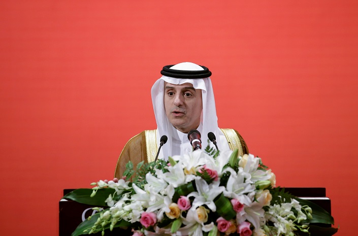 عادل الجبير خلال محاضرة في جامعة بكين (رويترز)