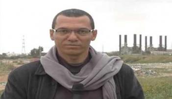 الصحفي الفلسطيني أيمن العالول