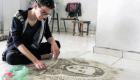 بالصور.. فلسطيني يحول الغبار إلى لوحات .. الطفل عمران أحدث أعماله