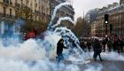 فيديو وصور.. المناخ يُشعل مواجهات مع شرطة باريس.. وآلاف الأحذية بدلا من التظاهر