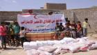 بالصور.. الهلال الأحمر الإماراتي يوزع 14 ألف سلة غذائية باليمن