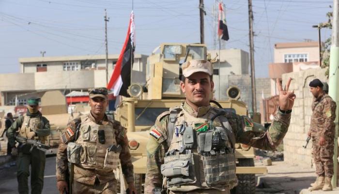 جنود عراقيون في أحد شوارع الموصل