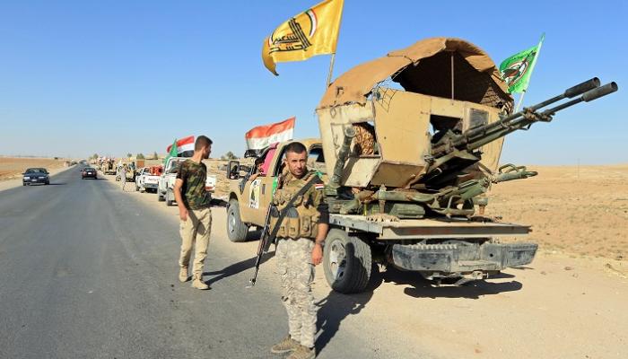 مليشيا الحشد الشعبي إلى جانب القوات العراقية في كركوك - رويترز