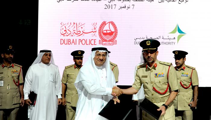 أثناء توقيع مذكرة التفاهم بين هيئة الصحة وشرطة دبي