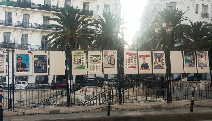 صور المرشحين في الانتخابات المحلية تنتشر بشوارع الجزائر
