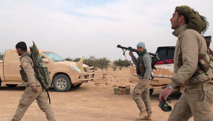 بعض مقاتلي قوات سوريا الديموقراطية - رويترز