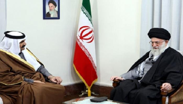 أمير قطر السابق خلال زيارته طهران