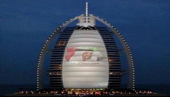 شكرا محمد بن زايد تزين برج العرب في دبي