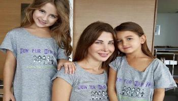 نانسي عجرم تعود لبناتها في استراحة من  The Voice Kid