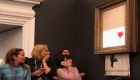 لوحة للفنان بانكسي تمزق نفسها فور بيعها في مزاد