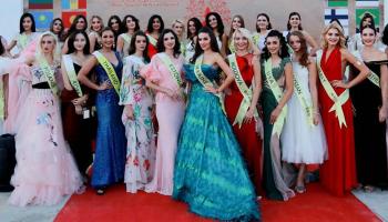 ملكة جمال أوكرانيا ترتدي فستانا للمصممة الإماراتية منى المنصوري
