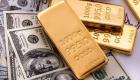 الذهب يهبط تحت ضغط ارتفاع الدولار 