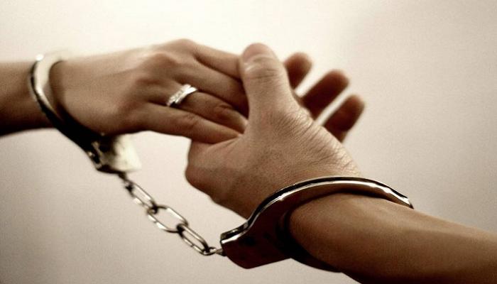 الكويت تشهد أول عقد قران لسجين وسجينة خلف القضبان - أرشيفية
