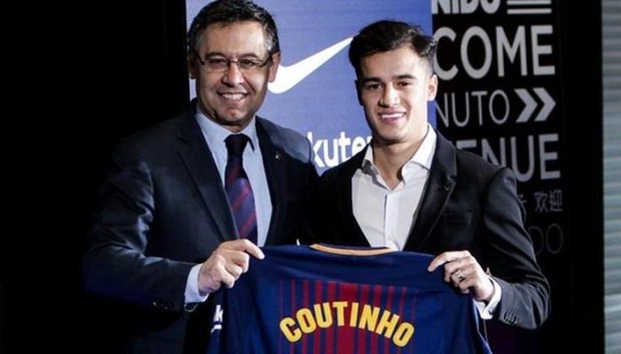 كوتينيو مع رئيس نادي برشلونة