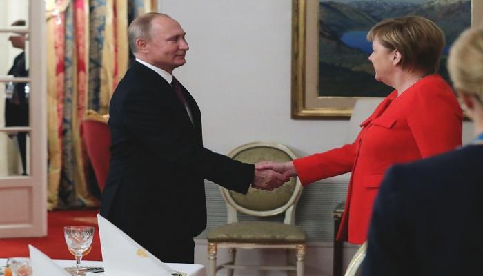 أنجيلا ميركل وفلاديمير بوتين - الفرنسية