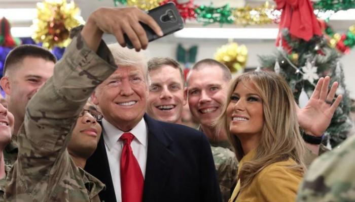 ميلانيا ترامب مع الرئيس الأمريكي وجنود الجيش في العراق