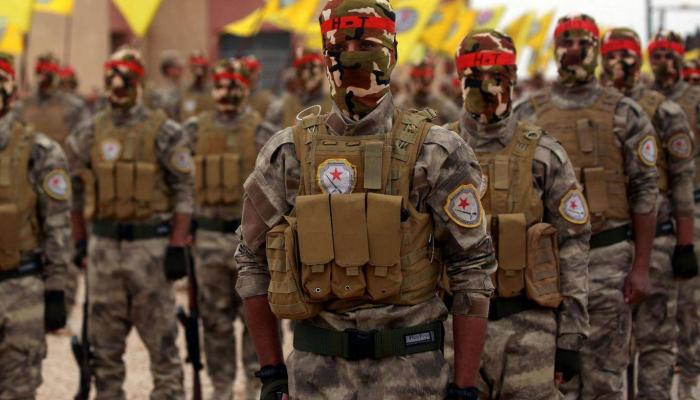 مقاتلون أكراد في حفل تخرج بالقامشلي