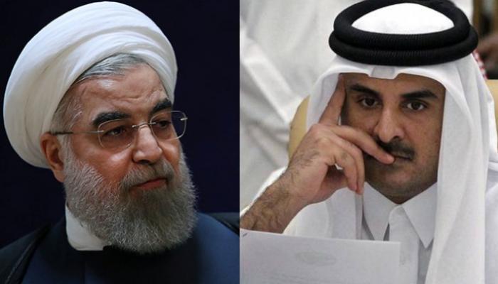 أمير قطر تميم بن حمد والرئيس الإيراني حسن روحاني