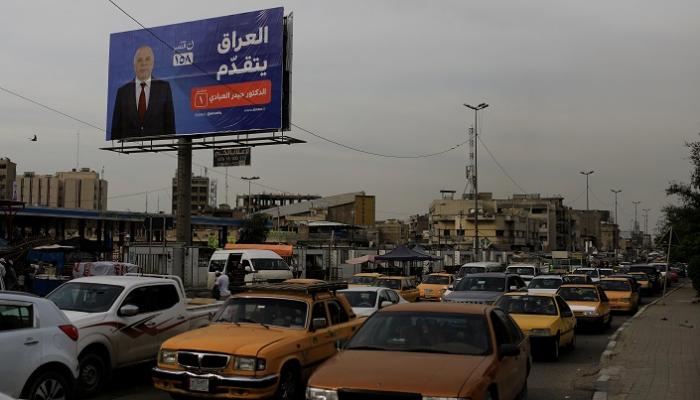 ملصق دعائي لقائمة رئيس الوزراء العراقي حيدر العبادي في بغداد - رويترز