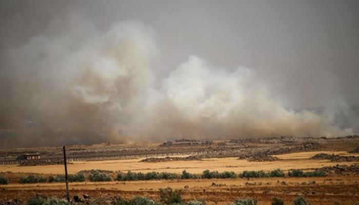 أعمدة الدخان تتصاعد جراء قصف النظام لدرعا - أ. ف. ب 