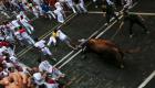 بالصور.. آلاف الإسبان يحتفلون بمهرجان الركض مع الثيران في بامبلونا