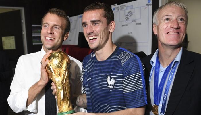 ماكرون مع جريزمان وديشامب