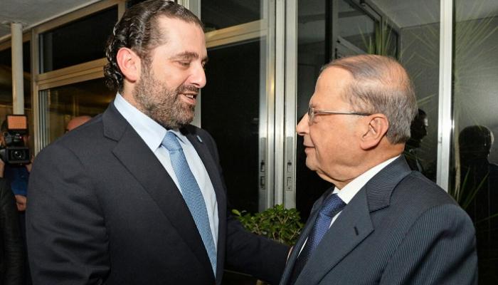 الرئيس اللبناني عون ورئيس الوزراء المستقيل سعد الحريري