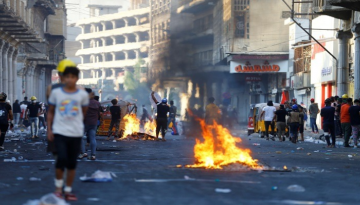 مصادمات بين المتظاهرين العراقيين ومليشيات الحشد - رويترز