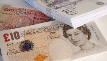 الإسترليني يتراجع أمام الدولار - أرشيفية