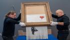 متحف ألماني يستضيف لوحة بانكسي "الممزقة ذاتيا"