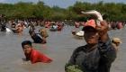 كمبوديون يحتفلون بنهاية حصاد الأرز بصيد الأسماك على الطراز القديم