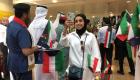 بالصور.. مطار دبي الدولي يستقبل الكويتيين بالورود والأعلام
