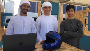 فلاح ومحمد وسلطان خلال مشاركتهم في مهرجان أبوظبي للعلوم 