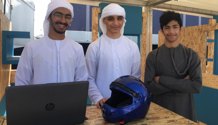 فلاح ومحمد وسلطان خلال مشاركتهم في مهرجان أبوظبي للعلوم