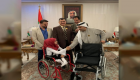 سفير الإمارات يسلم كراسي متحركة لأصحاب الهمم في العراق 