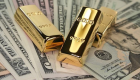 الذهب يهبط مع صعود الدولار بعد بيانات أمريكية قوية