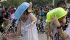 بالصور.. "رش المياه" في الصين.. مهرجان لإبعاد الأمراض والكوارث 