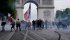 اشتباكات بين محتجين والشرطة في عيد فرنسا الوطني