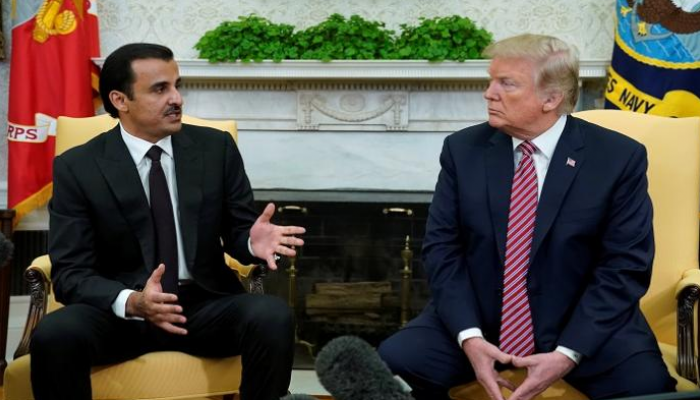 الرئيس الأمريكي وأمير قطر في لقاء سابق