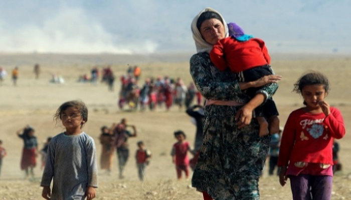 صورة أرشيفية لنازحين من الإيزيديين في العراق (رويترز)