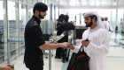 استقبال حجاج الإمارات بالورود في مطار أبوظبي