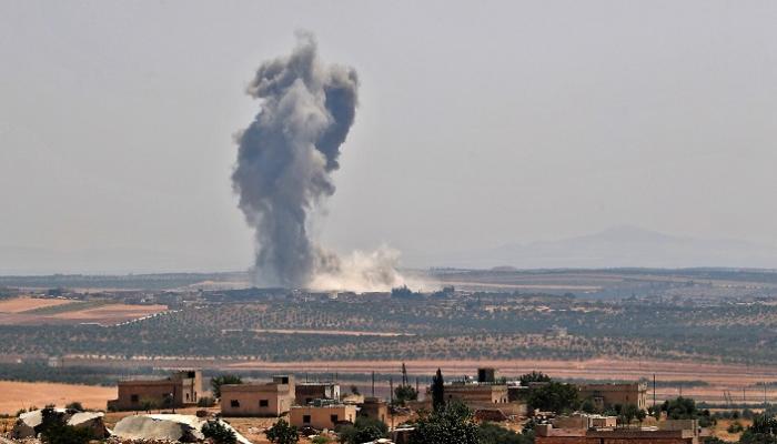 الدخان يتصاعد جراء القصف السوري - الفرنسية