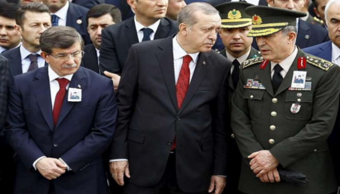 خلوصي آكار ورجب طيب أردوغان وأحمد داوود أوغلو - أرشيفية