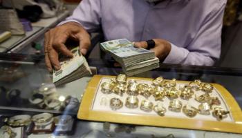 مشغولات ذهبية ودينارات ليبية