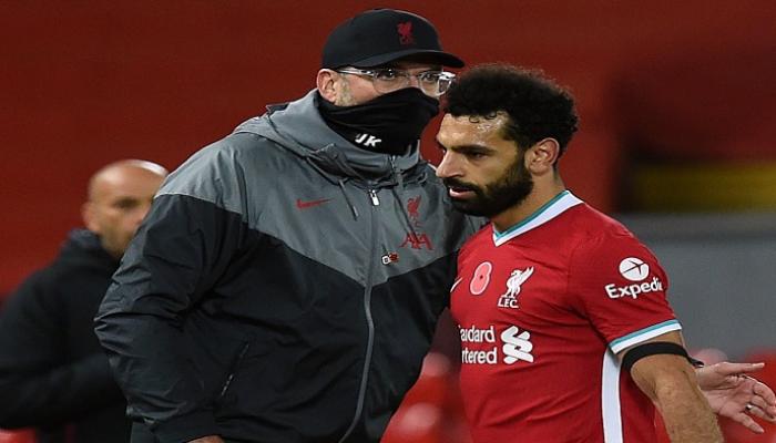 محمد صلاح نجم ليفربول ومدربه يورجن كلوب