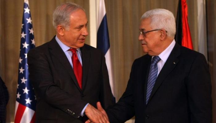 لقاء سابق بين الرئيس الفلسطيني محمود عباس ورئيس وزراء إسرائيل بنيامين نتنياهو