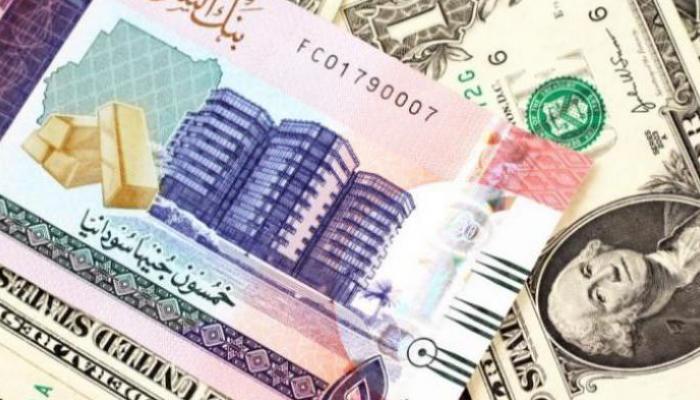  أوراق نقدية من الجنيه السوداني والدولار 
