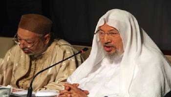 القرضاوي والغنوشي - أرشيفية 