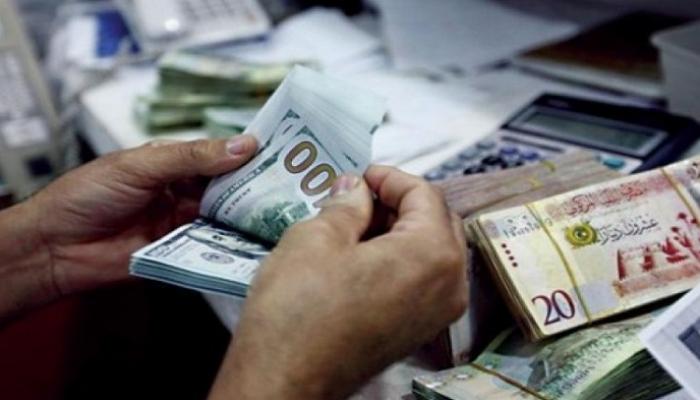 توحيد سعر الدينار الليبي أمام الدولار