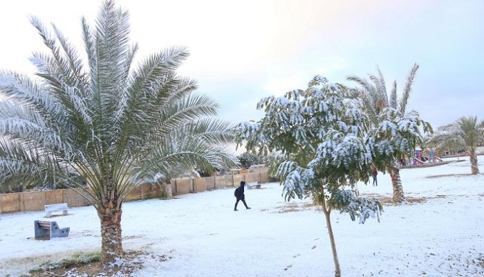 الثلوج تغطي شوارع بغداد